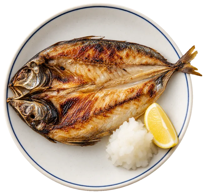 鯵の開きと大根おろしを盛った皿を真上から見たところ